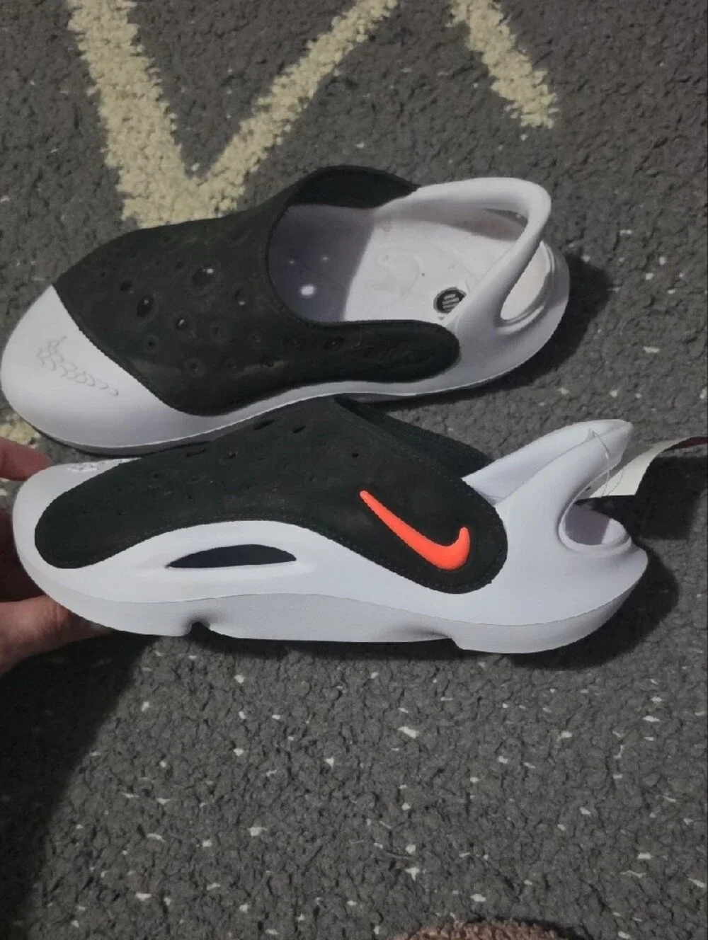 Nike Kids Black and White Slip-On Sandals with Perforated Upper